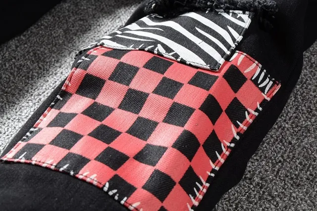 Black Distressed Patchwork Riveted Jeans 11