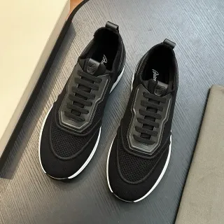 Sneakers de malla negra y sintética con cordones