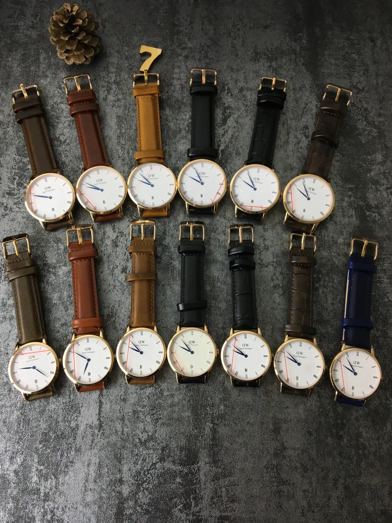 Daniel Wellington भूरी सोने की न्यूनतम पतली केस क्वार्ट्ज घड़ी 8