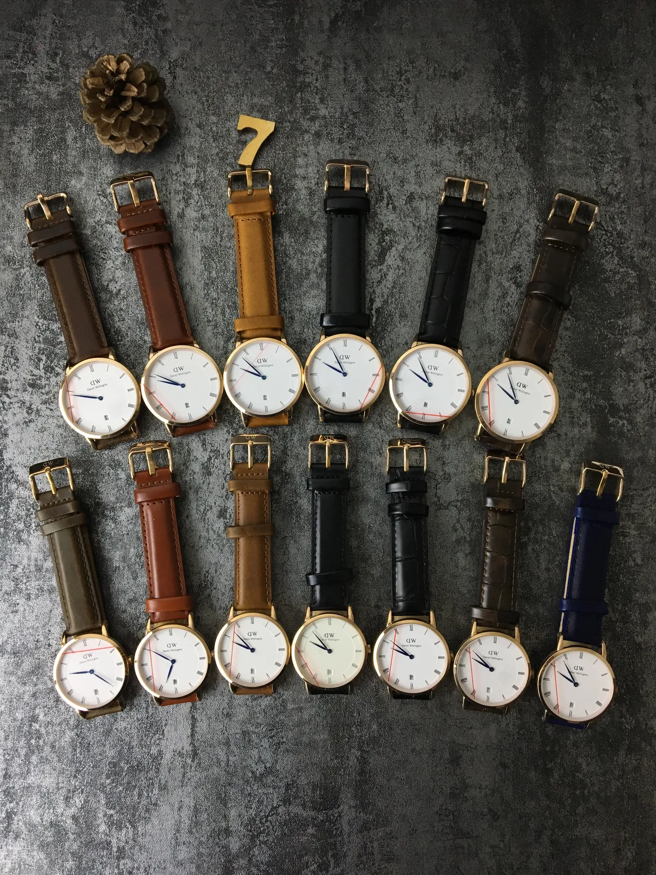 Daniel Wellington भूरी सोने की न्यूनतम पतली केस क्वार्ट्ज घड़ी 9