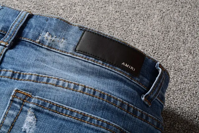 Distressed Slim-Fit Mid-Rise Blue Jeans 3