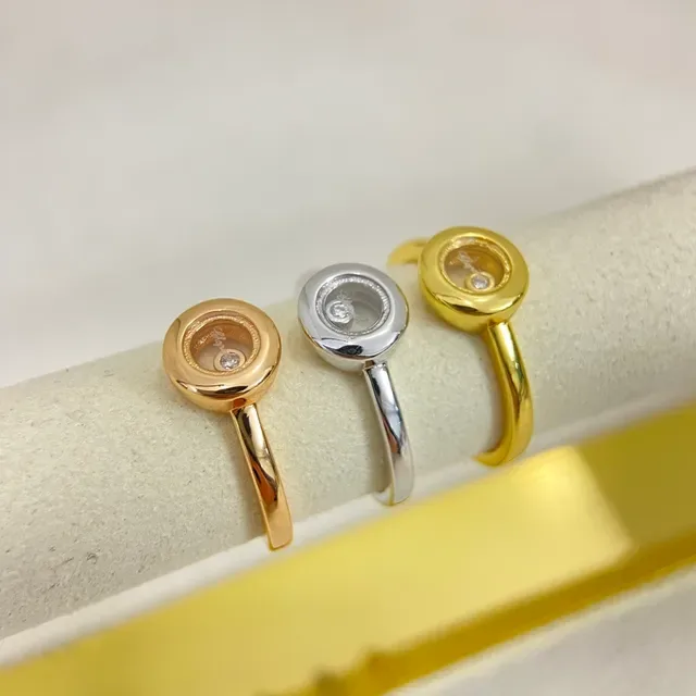 Gold Silver Rotating Bezel Single Central Diamond Ring 2