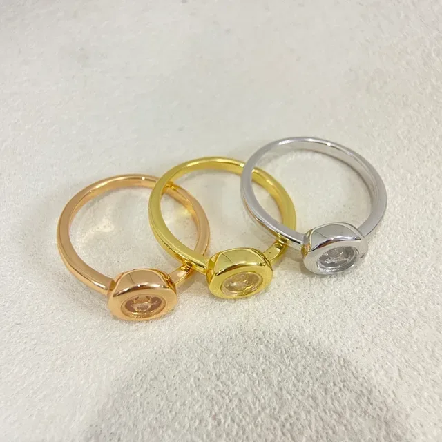 Gold Silver Rotating Bezel Single Central Diamond Ring 3