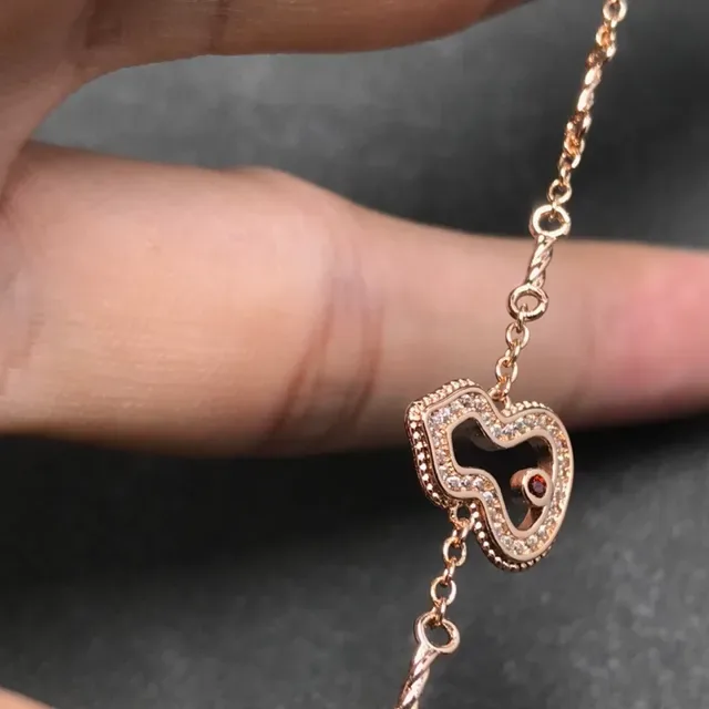 Gold-Tone Twisted Chain Heart Pendant Bracelet 4