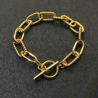 Pulsera con Toque Dorado, Cuerda Trenzada y Eslabón Oval, Hebilla Toggle