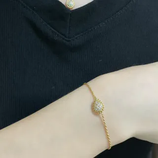 Cadena de eslabones retorcidos de tono dorado Pavé brazalete ovalado