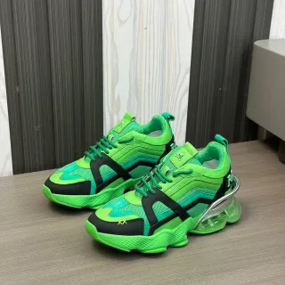 أحذية رياضية سميكة خضراء وسوداء oversized sculptured midsole شبكية متعددة الطبقات وتراكبات اصطناعية