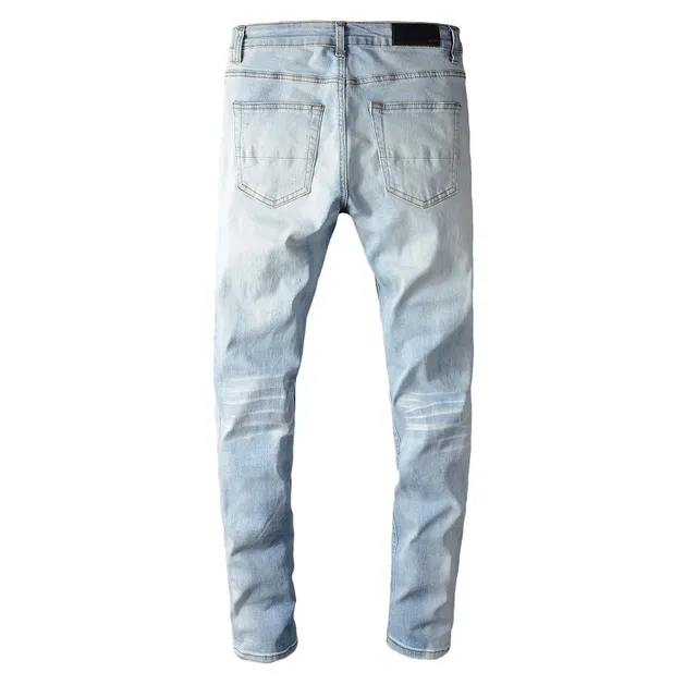 हल्की धुलाई distressed slim fit ripped जींस 15