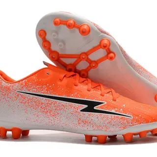 Naranja y blanco salpicado Low-Cut Firm-Ground zapatillas de fútbol