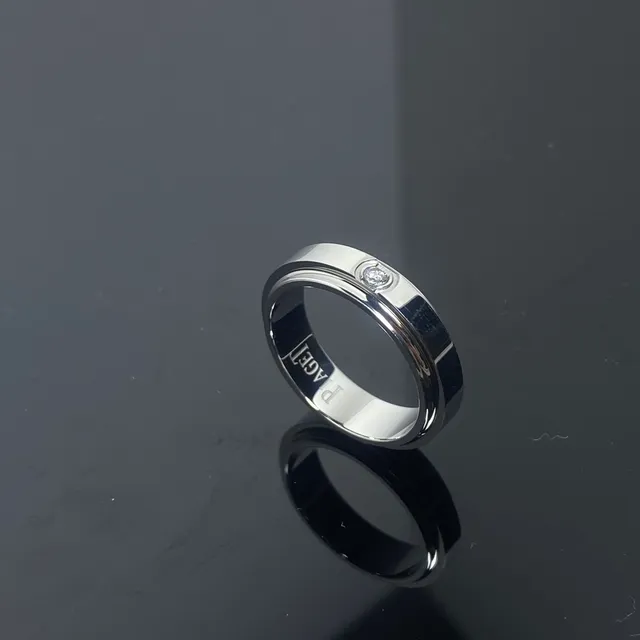 Piaget Possession Gold and Silver Single-Stone Rotating Bezel Rings 4
