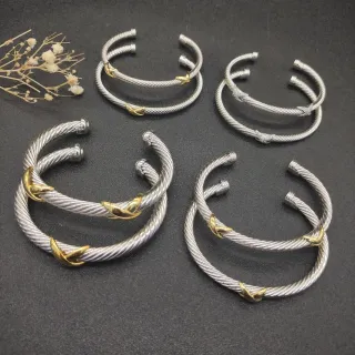 سوار مفتوح كابل ملتوي فضة وذهب