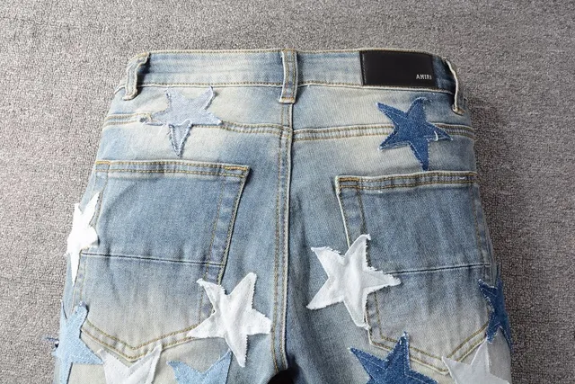 Star-Appliqué Distressed Light-Wash Slim Fit Jeans 11