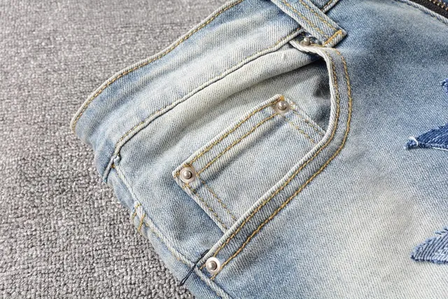 Star-Appliqué Distressed Light-Wash Slim Fit Jeans 14