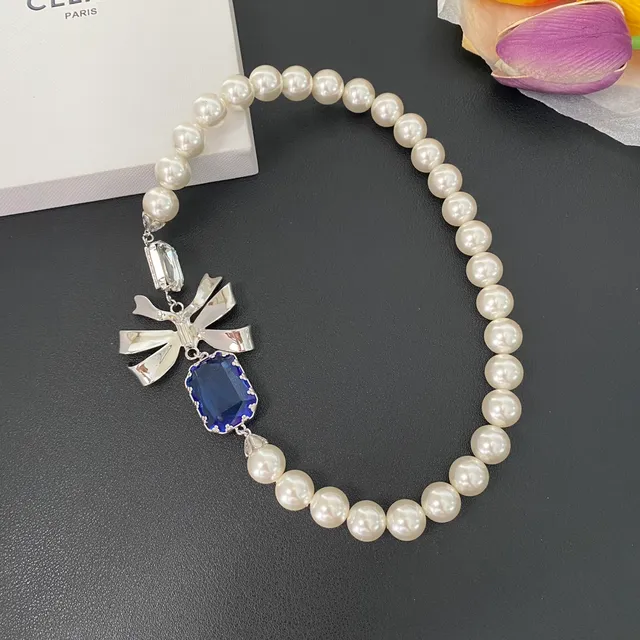 White Blue Pearl Strand Silver Bow Motif Necklace 8