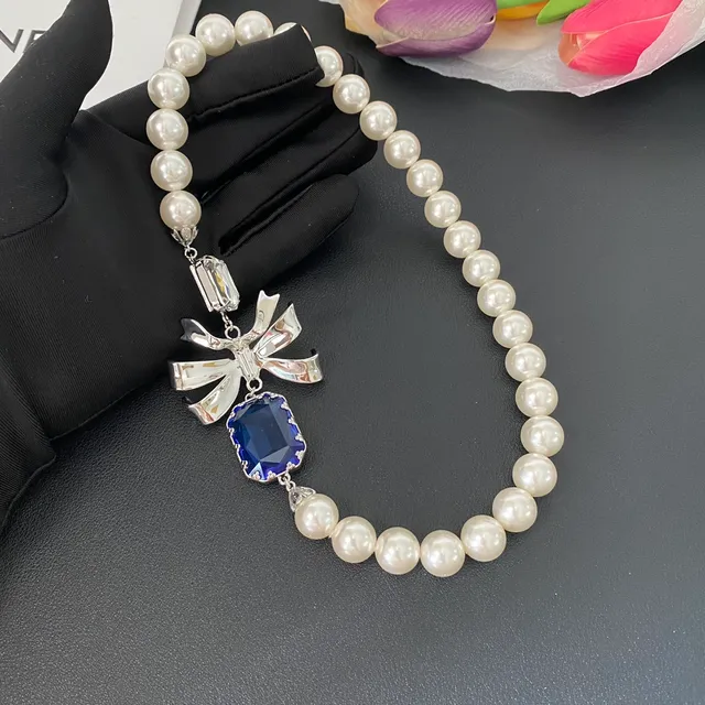 White Blue Pearl Strand Silver Bow Motif Necklace 9