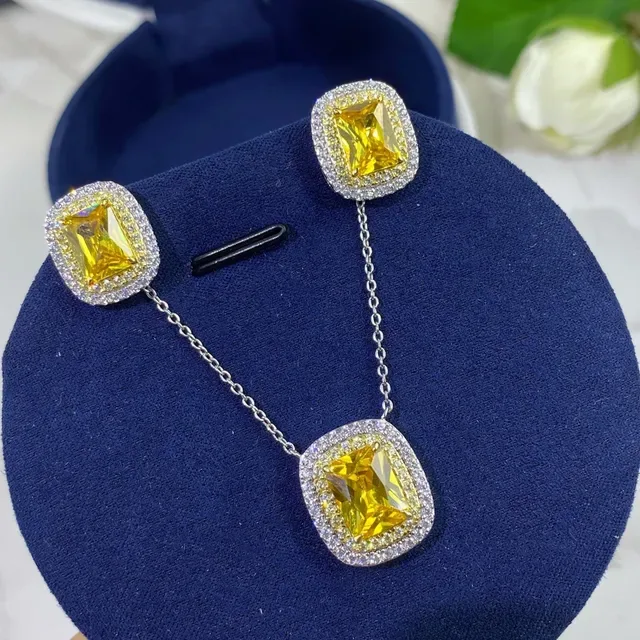 Brincos de prata com pedra central de corte cushion amarela e halo 4