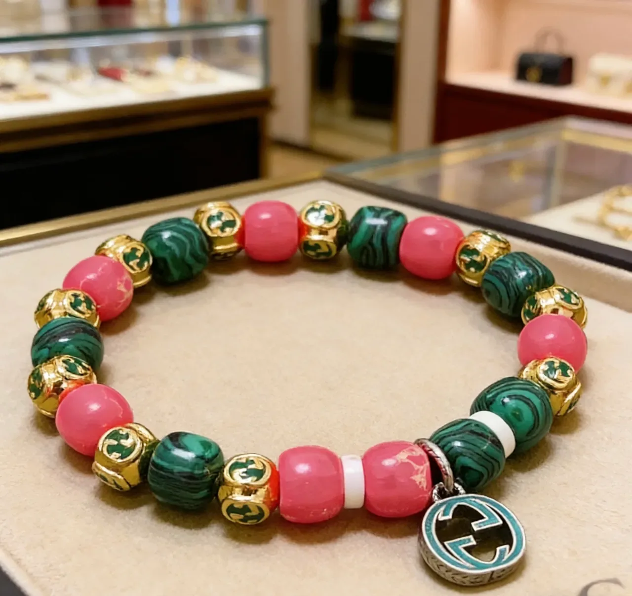 Gucci Beaded Malachite and Pink Stone Interlocking G Charm Bracelet 7