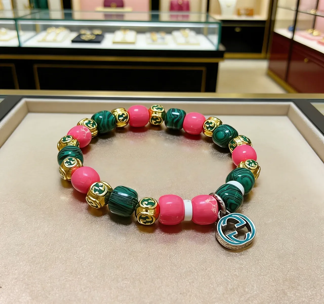 Gucci Beaded Malachite and Pink Stone Interlocking G Charm Bracelet 9