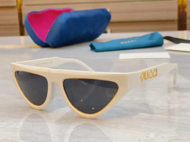 Gucci lunettes de soleil en acétate noir doré brillant avec détail de logo 9