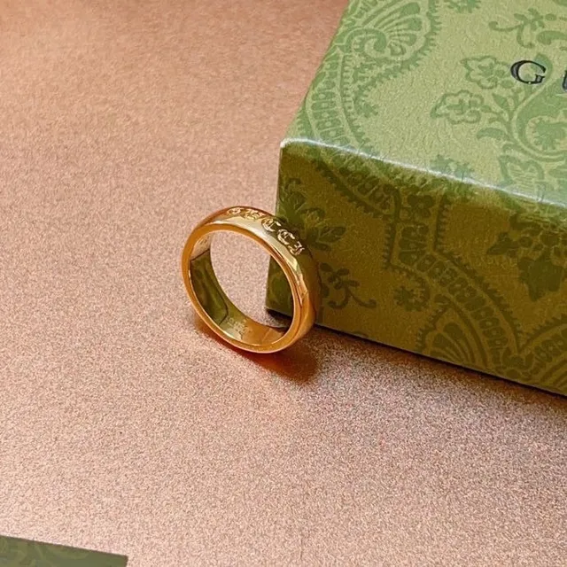 Gucci GG Engraved Wide Band Gold Ring 6