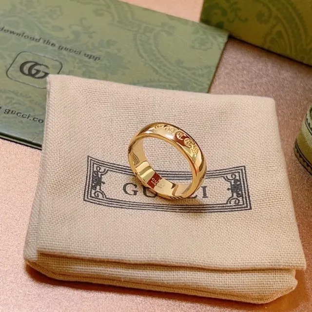 Gucci GG Engraved Wide Band Gold Ring 9