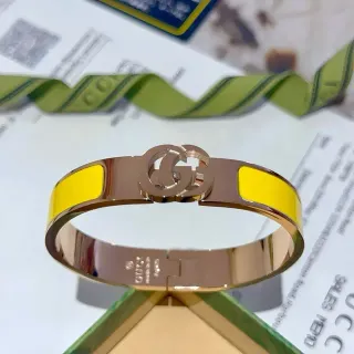 Gucci GG Marmont سوار مفصلي مينياء أصفر ذهب وردي