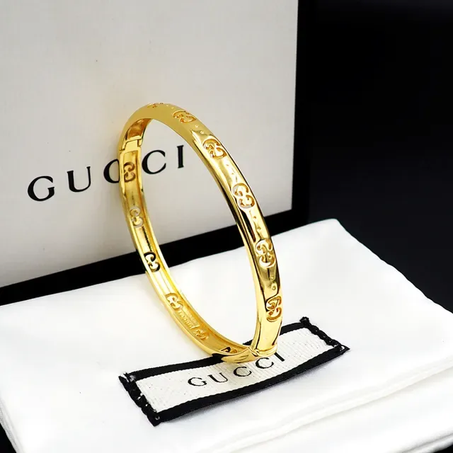 Gucci गोल्ड पॉलिश्ड इंटरलॉकिंग GG मोटिफ ब्रेसलेट 7