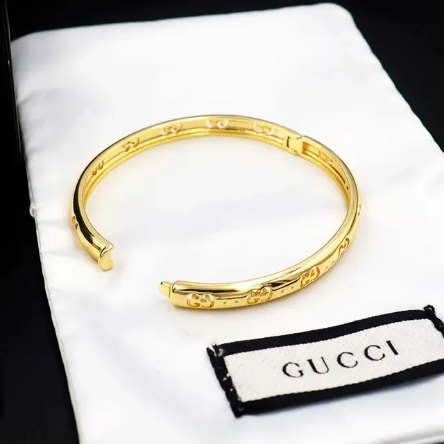Gucci गोल्ड पॉलिश्ड इंटरलॉकिंग GG मोटिफ ब्रेसलेट 10
