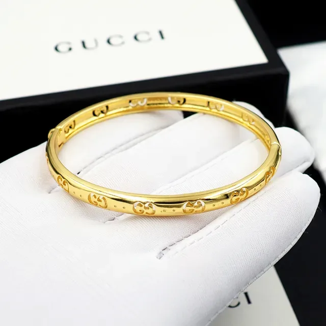 Gucci गोल्ड पॉलिश्ड इंटरलॉकिंग GG मोटिफ ब्रेसलेट 11