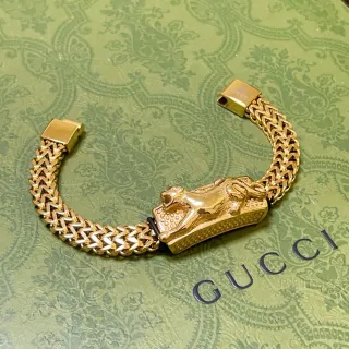 Gucci Pulseira Cabeça de Leão Fecho de Ouro Corrente Trançada Franco