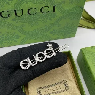 Gucci Silver Crystal-Encrusted Logo-Shaped Brooch