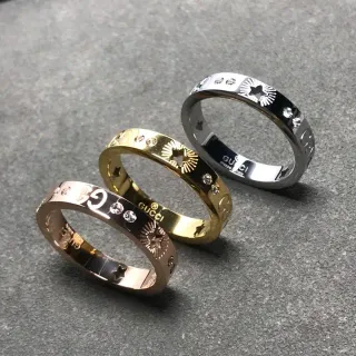 Gucci Silver Gold Engraved Star-Sunburst Motif Interlocking G Logo Detail Ring