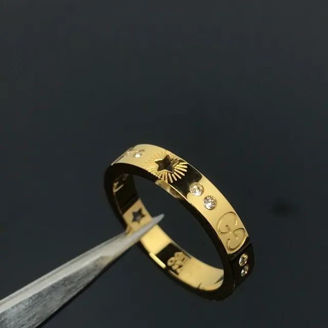Gucci Silver Gold Engraved Star-Sunburst Motif Interlocking G Logo Detail Ring 2