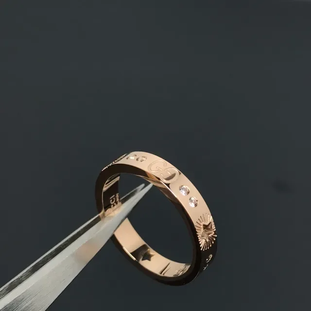 Gucci Silver Gold Engraved Star-Sunburst Motif Interlocking G Logo Detail Ring 3