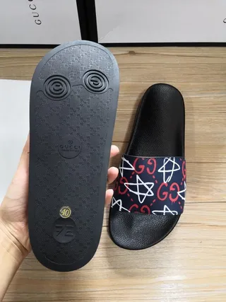 Gucci Slide काली और नेवी GG Star Print चप्पल 5