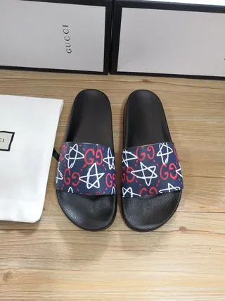 Gucci Slide काली और नेवी GG Star Print चप्पल 8