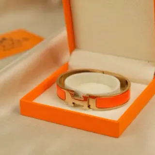 Hermès Clic H Orange Enamel Gold-Tone Rigid Bracelet