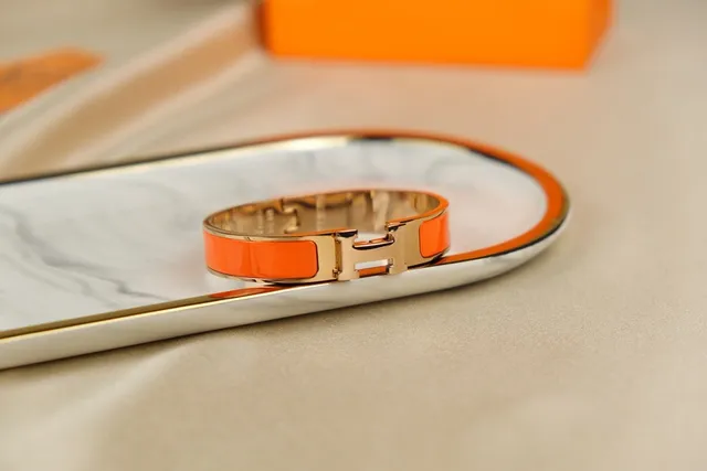 Hermès Clic H Bracelet rigide émail orange doré 6