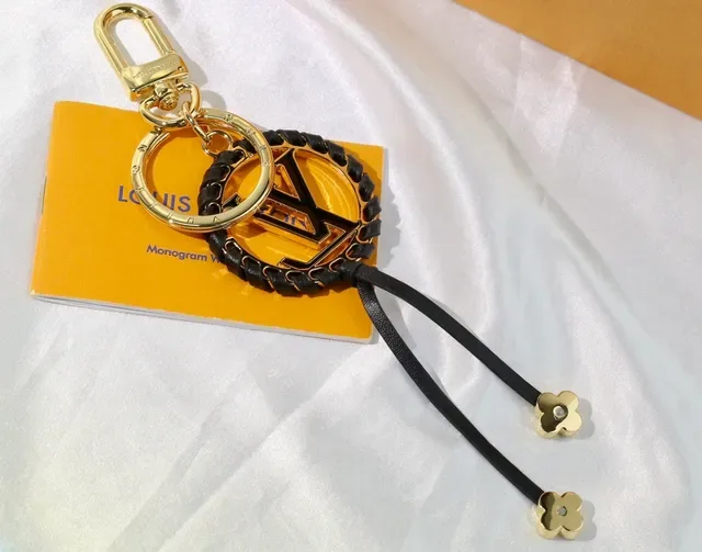 Louis Vuitton Black Gold Monogrammed Circular Medallion Braided Leather Trim Handbag 2