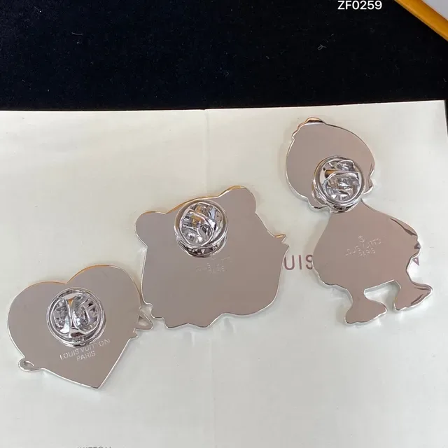 Louis Vuitton Enamel Duck and Bear Silhouette Pendant Necklaces 8