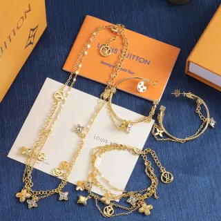 Collier Louis Vuitton Chaîne de maillons or et argent avec charms de monogram LV