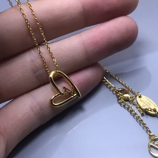 Louis Vuitton Gold-Tone LV Heart and Monogram Disc Necklace 2