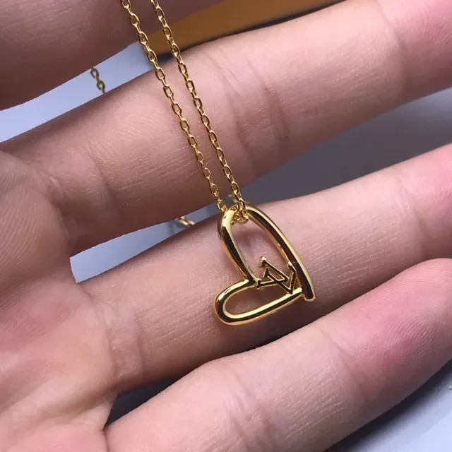 Louis Vuitton Gold-Tone LV Heart and Monogram Disc Necklace 3
