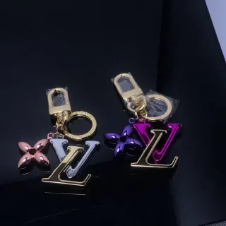 سوار لويس فيتون LV زهرة ذهبي بنفسجي معدني مونوغرام أربع بتلات تعويذة