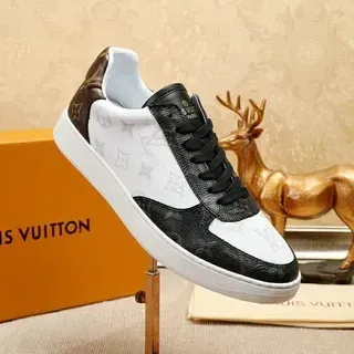 Louis Vuitton LV Trainer Blanco Negro Monogram Lona Superposición de Cuero Estilo de Vida Zapatillas