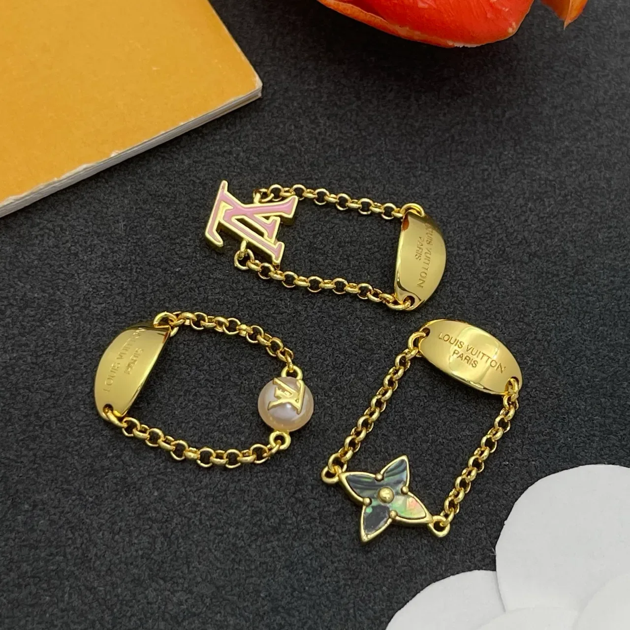 Louis Vuitton Monogram and Flower Motif Gold-Tone Chain Rings 6