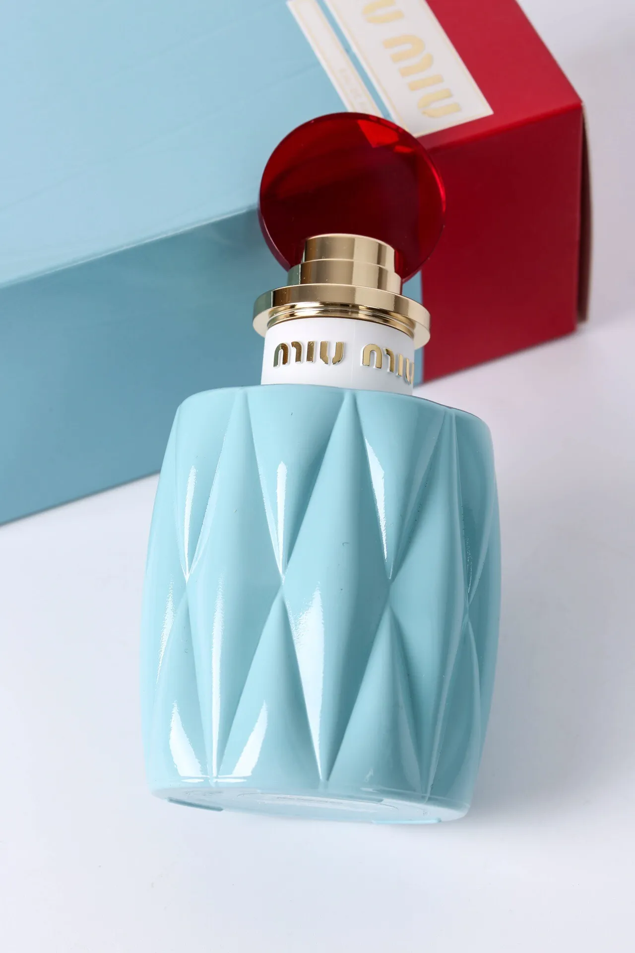 Miu Miu Twist Bleu Rouge Bouteille Facetée Géométrique Bouchon Sphérique Parfum 2