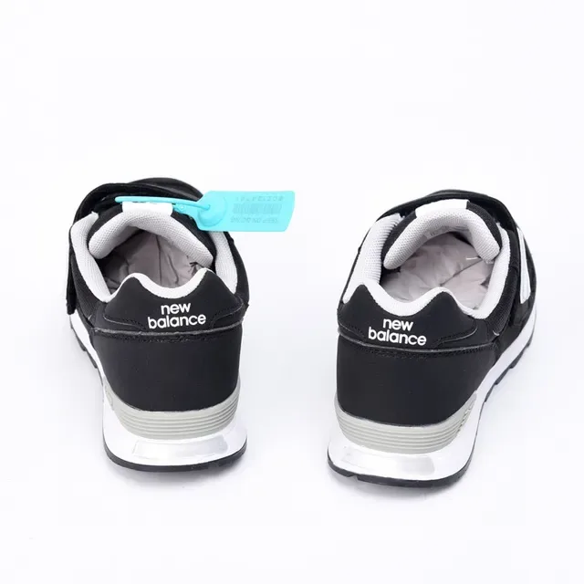 New Balance 574 Black White Gray Chaussures Lifestyle pour Enfants 5