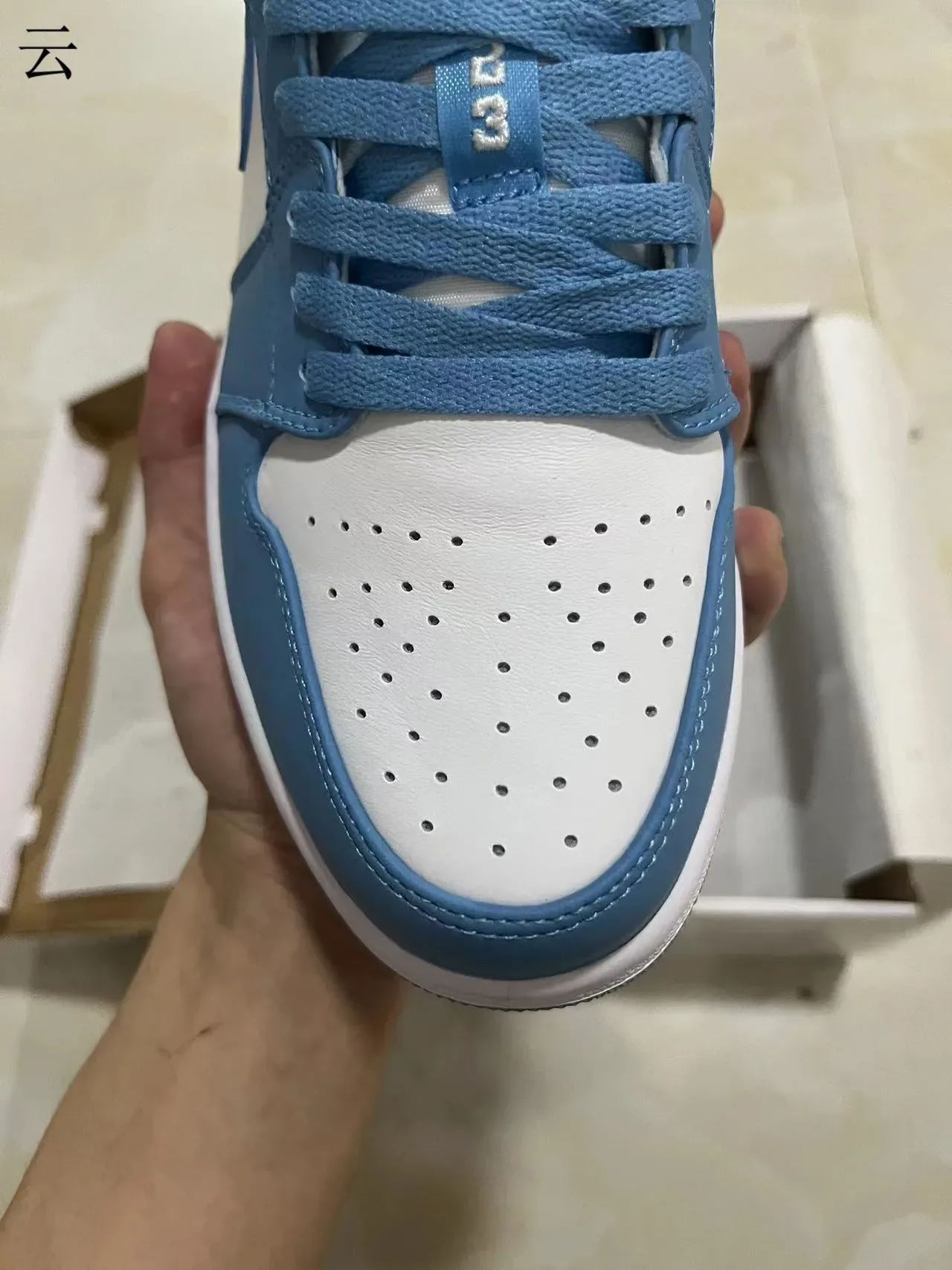 Nike Air Jordan 1 Low University Blue White tênis lifestyle 3