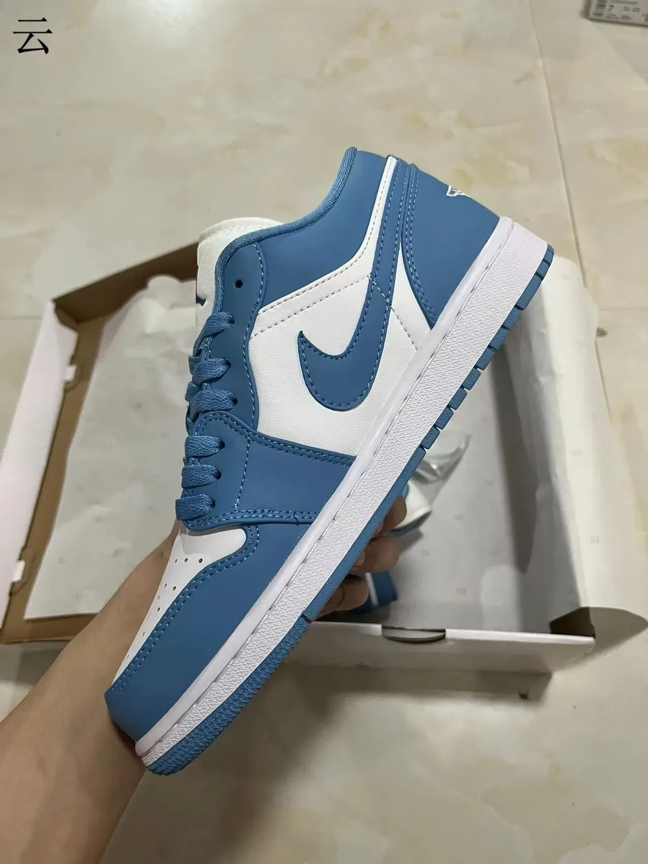Nike Air Jordan 1 Low University Blue White tênis lifestyle 4